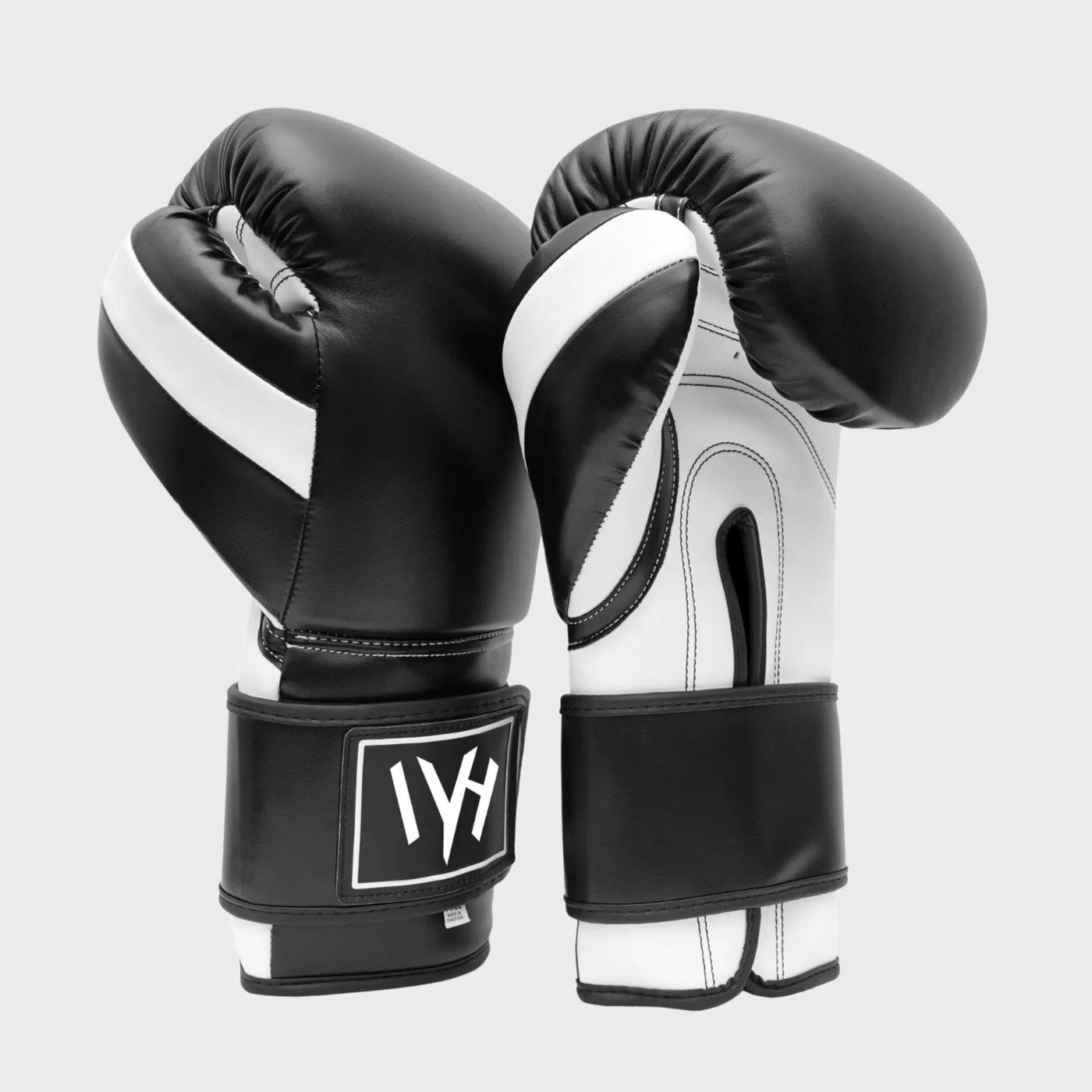 mayhm premium boxing gloves MAYHM Premium Boxing Gloves Black and White professional training gloves with secure wrist support.